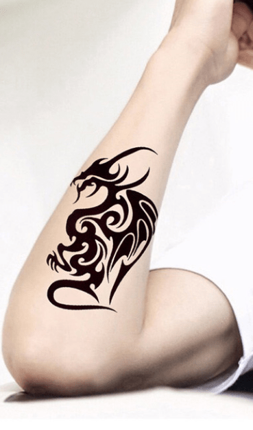 tatouage changeable tribal dragon